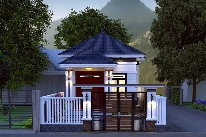 Cổng nhà có đèn chiếu sáng hai bên, giúp không gian thêm sáng sủa vào ban đêm
