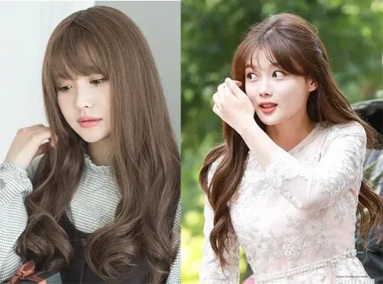 Tóc xoăn nhỏ dài mang đến vẻ ngoài ấn tượng cho mặt tròn béo