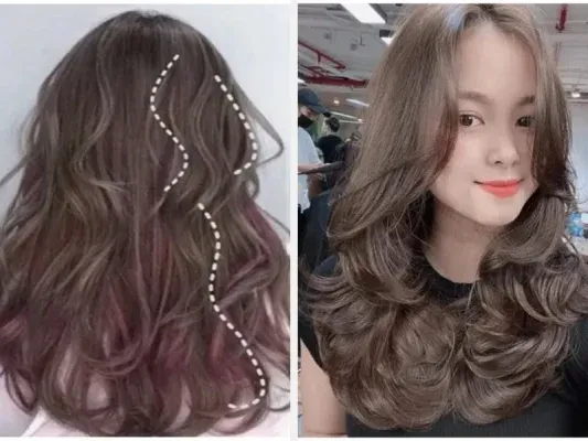 Cô gái với tóc layer dài uốn sóng nhẹ cho mặt tròn